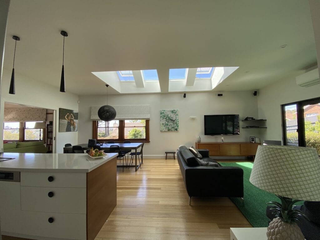 A Melbourne living room with a bank of 4 skylights above the room