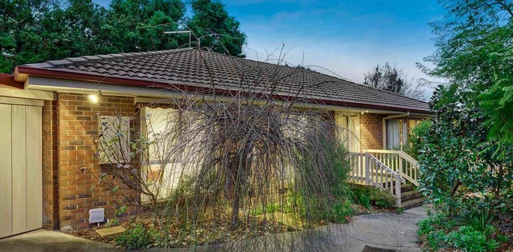 Front view of a Melbourne brick home with a tile roof