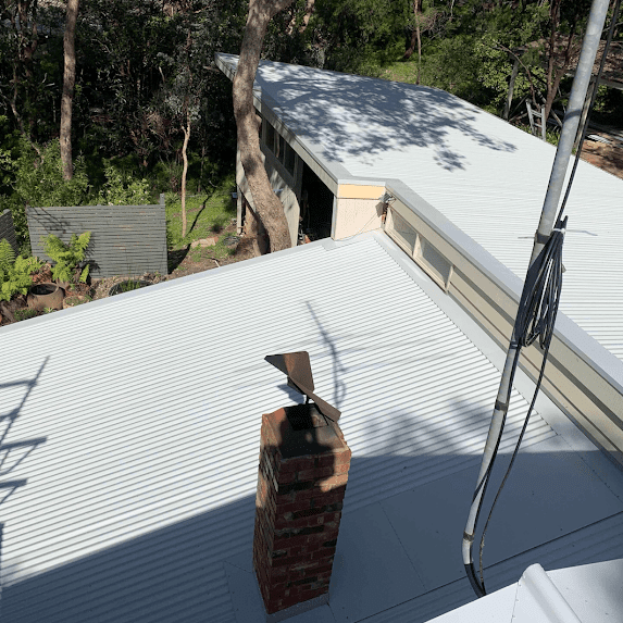 Colorbond Reroof With Velux Skylights And Cement Sheet Cladding