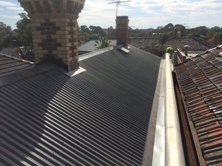 10823 Tiled roof replaced with Colorbond & new box gutter - North Fitzroy
